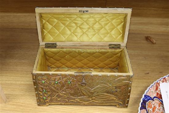 An Art Nouveau hammered and beaded casket length 30cm